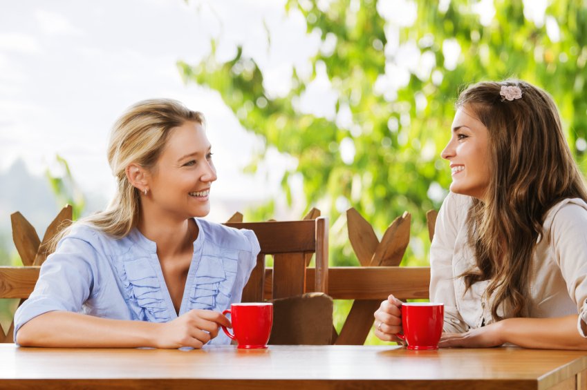 Two Friends Chatting With Coffee