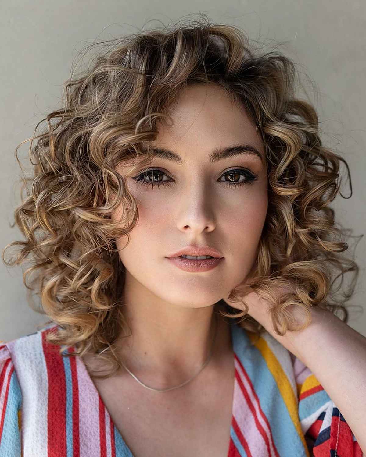 13 Stylish Hairstyles For Short Curly Hair That Are Easy To Maintain