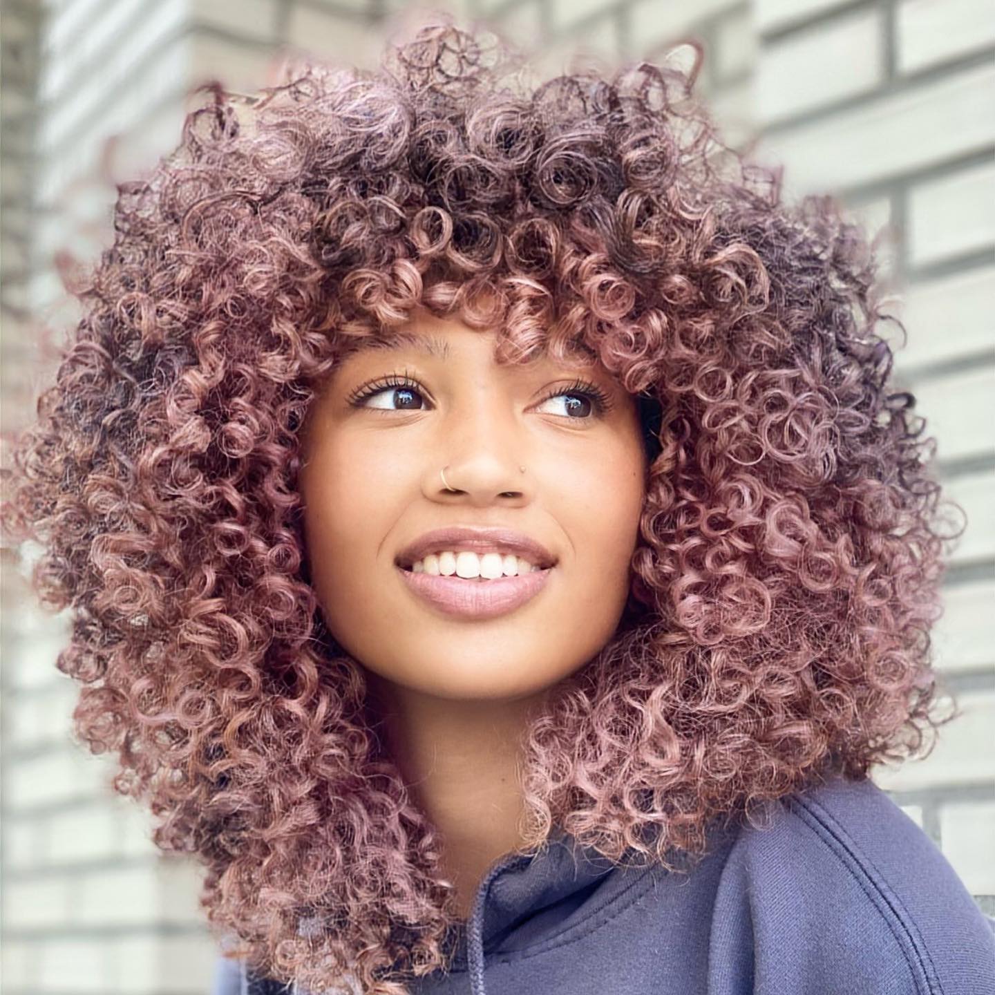 30 Cool Ways to Wear Trendy Curly Hair with Bangs in 2024 - Hair Adviser