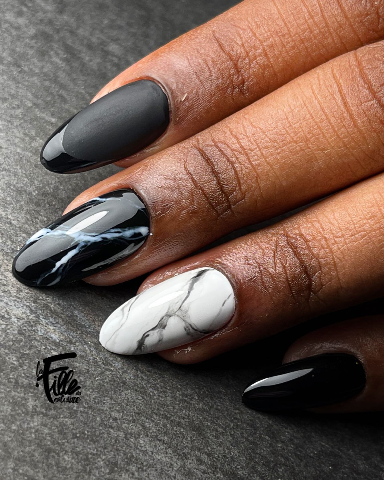 almond-shaped black and white marble nails | Black and white nail art, Black  and white nail designs, White nail designs