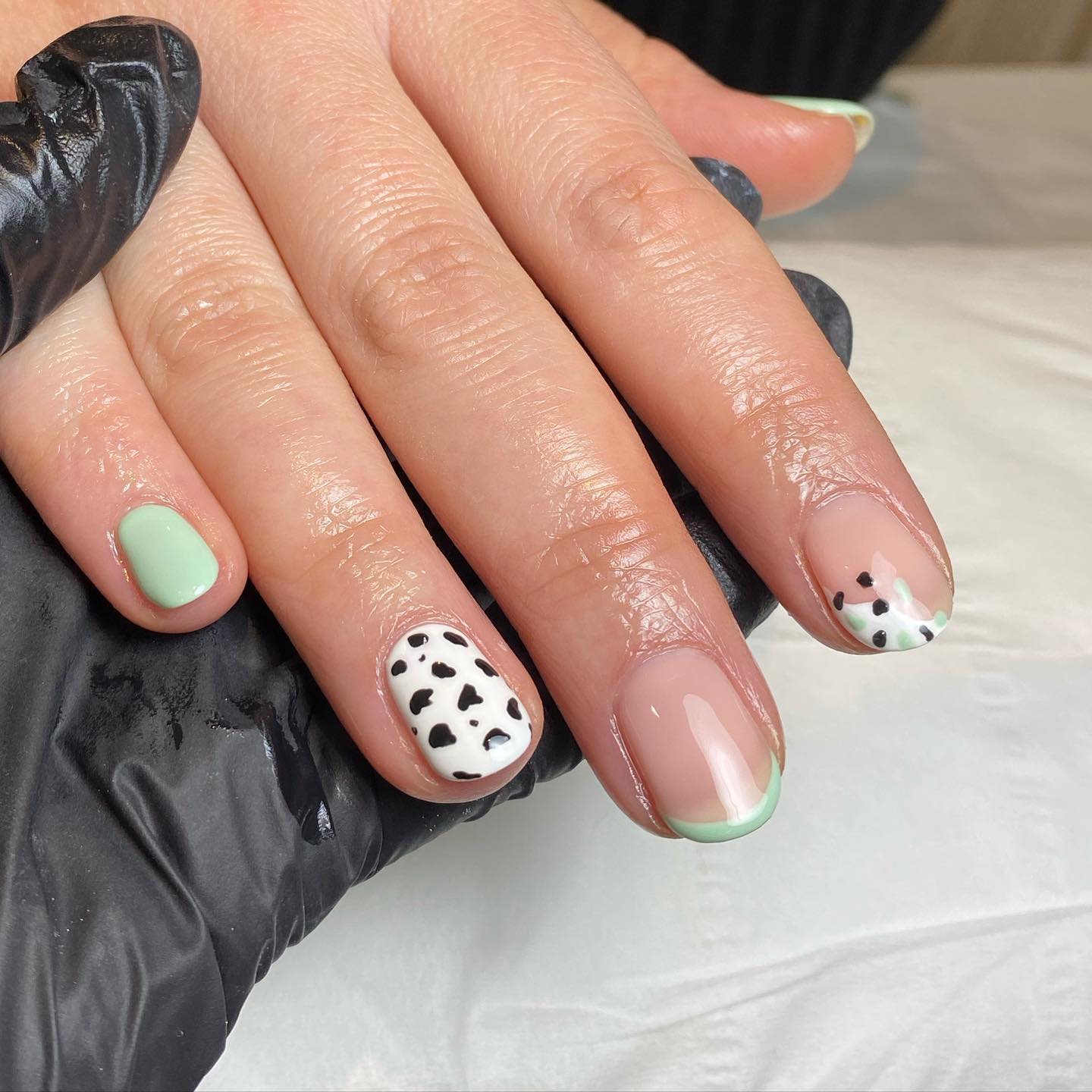 Female Hand with Glitter Green Nail Design. White Nail Polish Manicure  Stock Image - Image of manicure, female: 203451839